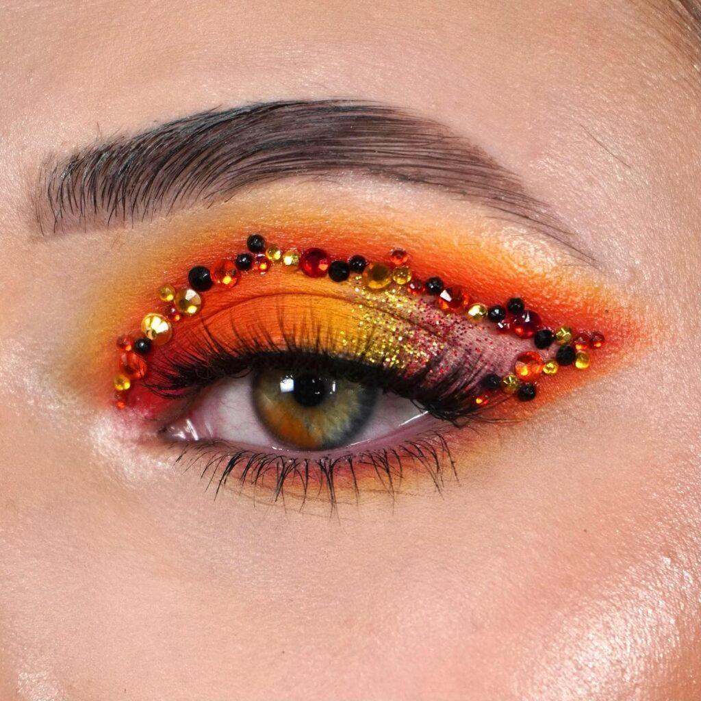 29. Fire Bloom rhinestone eye makeup